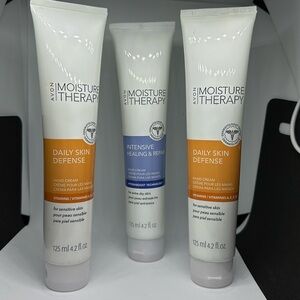 Set o/3 Avon Moisture Therapy (2)Daily Skin Defense, (1)Intensive Healing Lotion